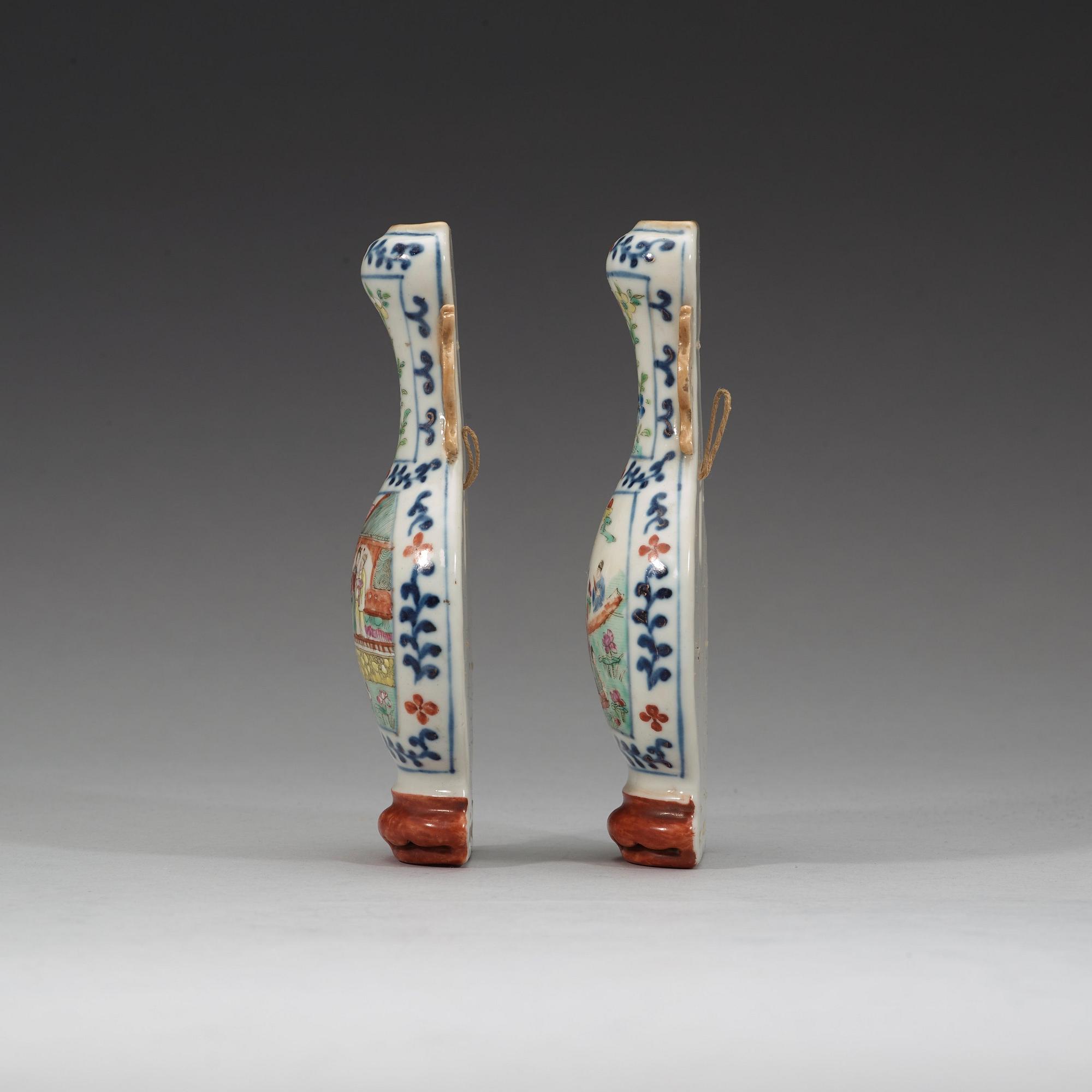 A pair of famille rose wall vases, late Qing dynasty, circa 1900.
