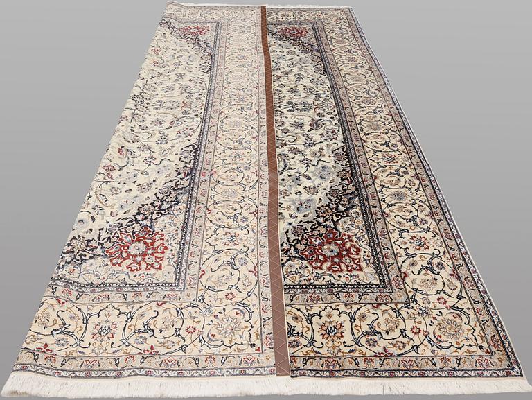 A Nain carpet, part silk, so-called 6LAA, c. 310 x 211 cm.