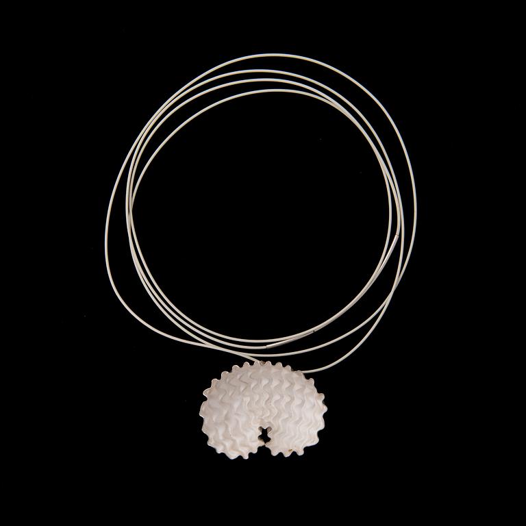 A NECKLACE, "Shelter", etched white silver, white rubber band, 2010.