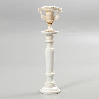 Pedestal with urn, 20th century.