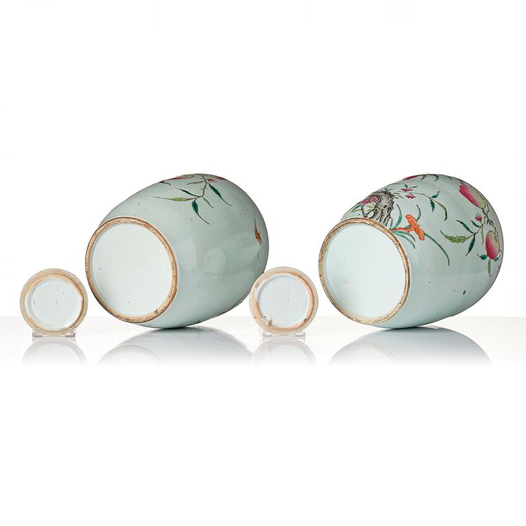 A pair of famille rose 'peaches' jars with cover, Qing dynasty, circa 1900.