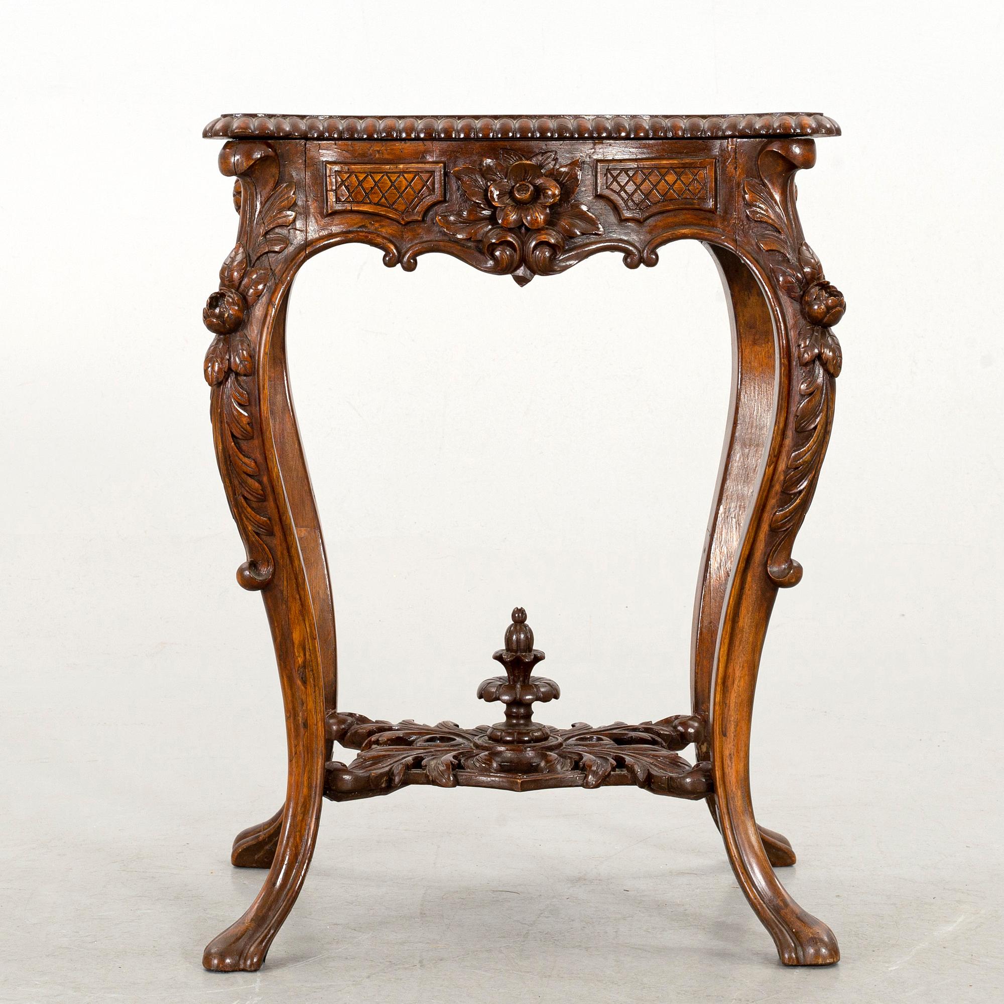 A NEO ROCOCO SMALL TABLE.