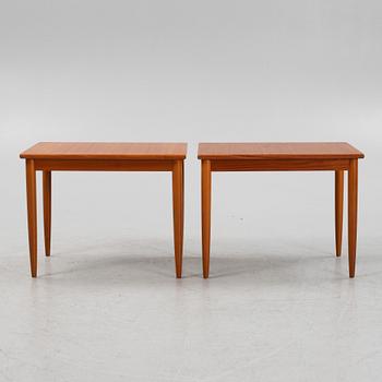 A pair of teak veneered side tables, second part of the 20th Century.