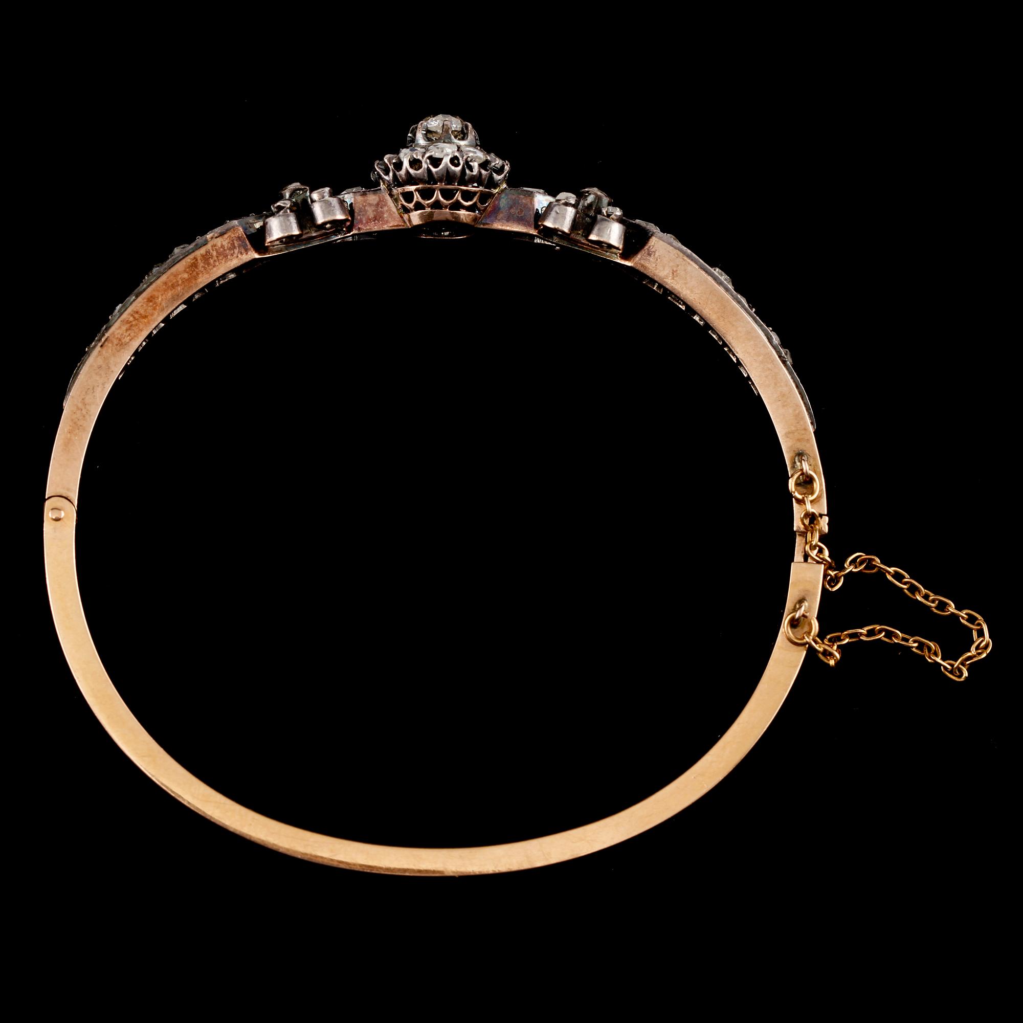ARMBAND, 18k guld och silver med fasettslipade diamanter, 1800-talets slut. Vikt 14 g.