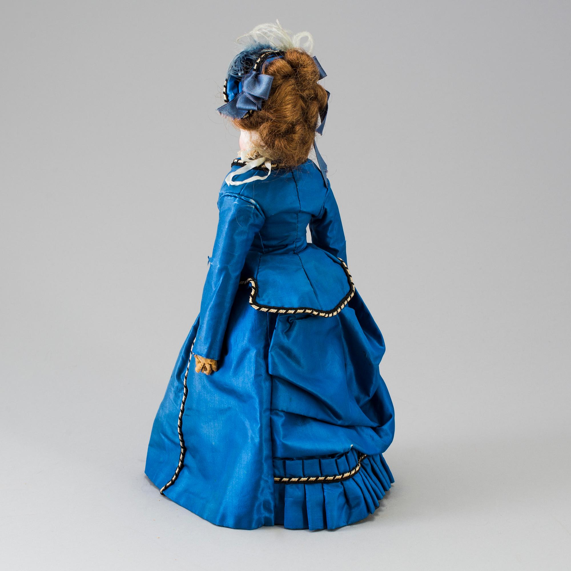 A bisque head fashion doll, probably France, late 19th century.