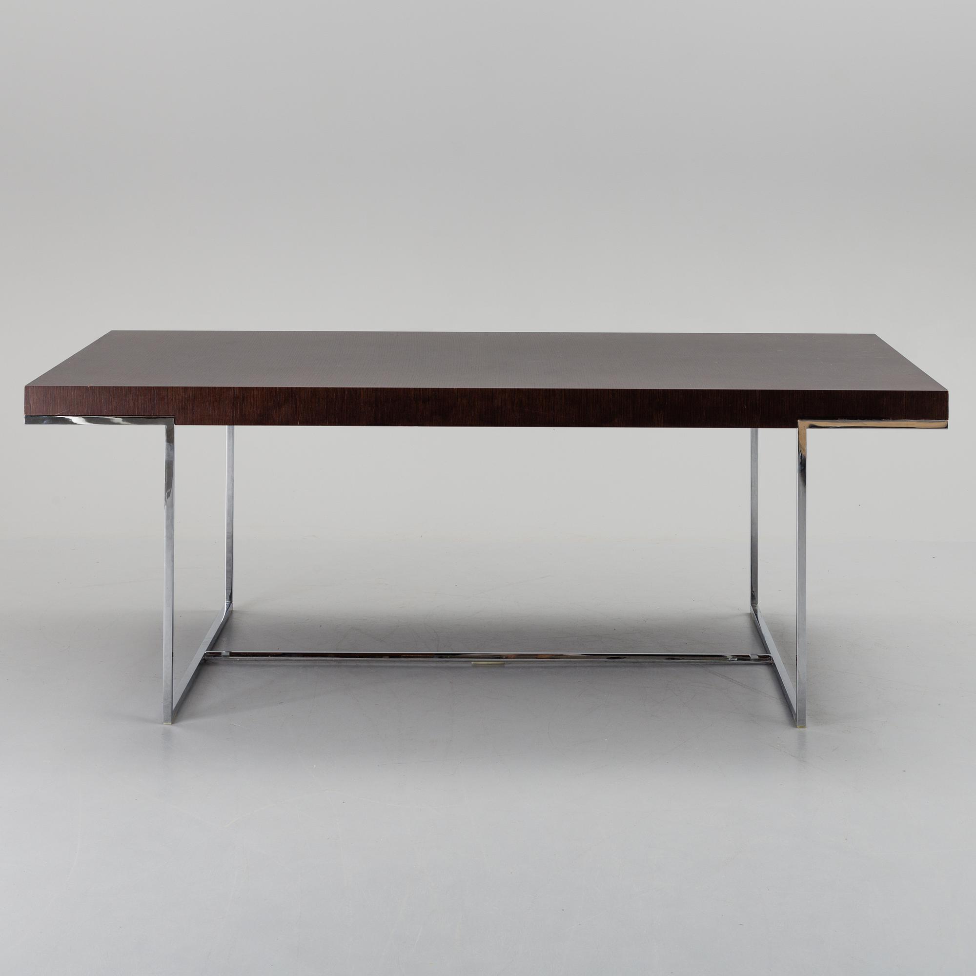 A "Athos" dining table by Paolo Piva for B&B Italia.