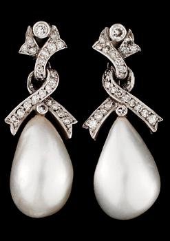 639. A pair of gold and natural pearl earrings.