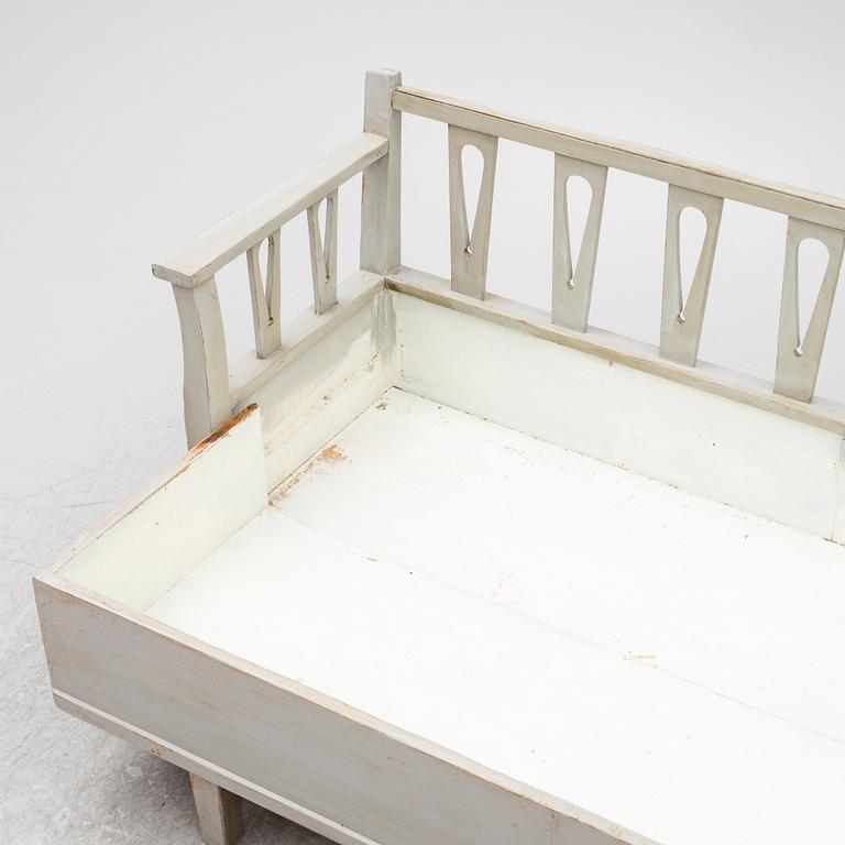 A Gustavian style sofa, early 20th century.