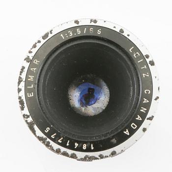 Leica camera with 4 lenses.