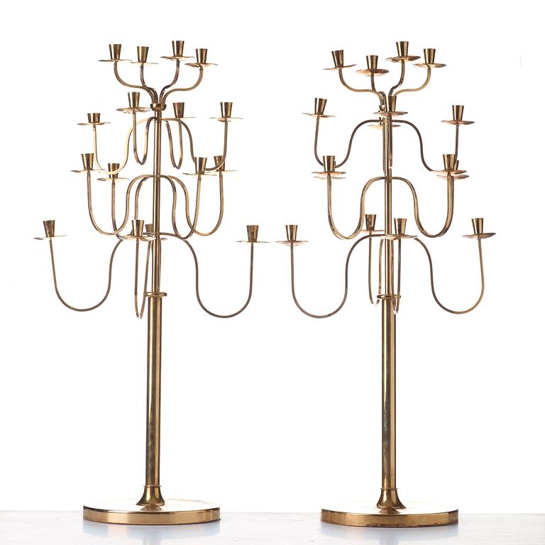 Svenskt Tenn, a pair of Swedish Modern brass candelabra, 1940-50's, probably designed by Josef  Frank.