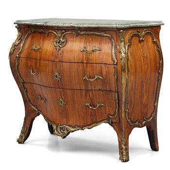 5. A rococo parquetry and gilt brass-mounted commode by L. Nordin (master in Stockholm 1743-1773).
