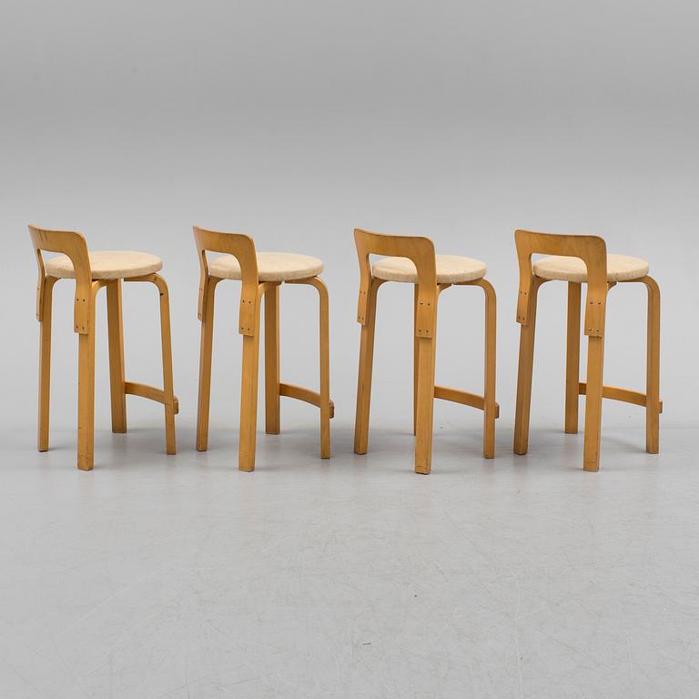 Four model K 65 bar stools by Alvar Aalto for Artek, Finland.