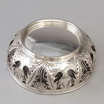 A Swedish Art Nouveau silver bowl with glass insert, decorated with dandelion, maker's mark K Anderson Stockholm 1906.