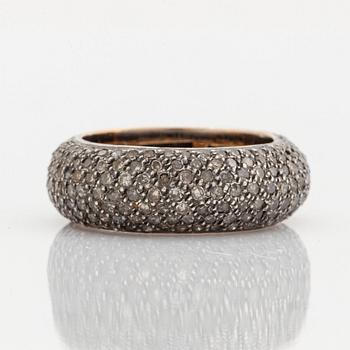Silver and diamond ring.