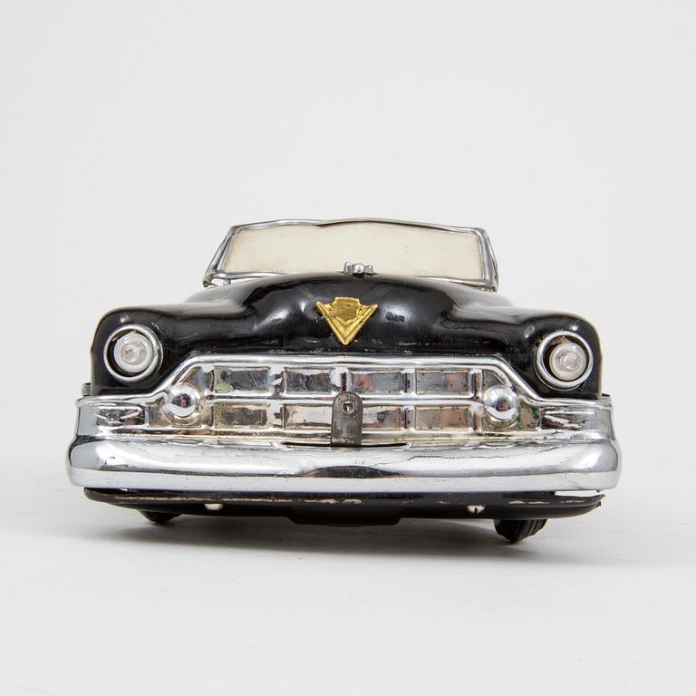 A Nomura Toys Cadillac Japan 1950s.