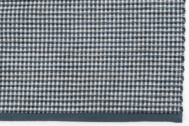Gunilla Lagerhem Ullberg, a flat-woven 'Häggå' carpet, Kasthall, 2021, ac. 370 x 310 cm.