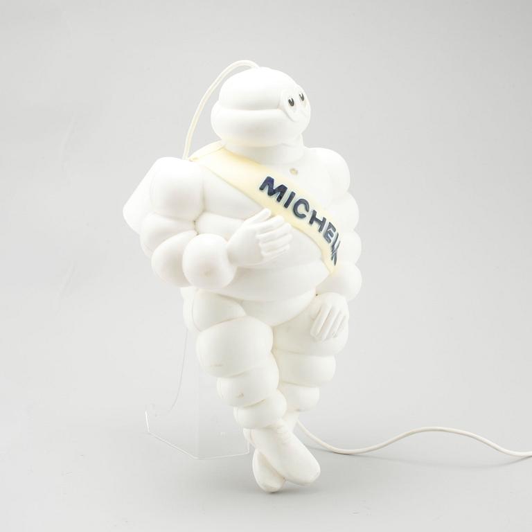 A plastic Michelin Man Lamp from 1966.