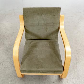 Alvar Aalto, a pair of birch armchairs model nr 402 21st century.
