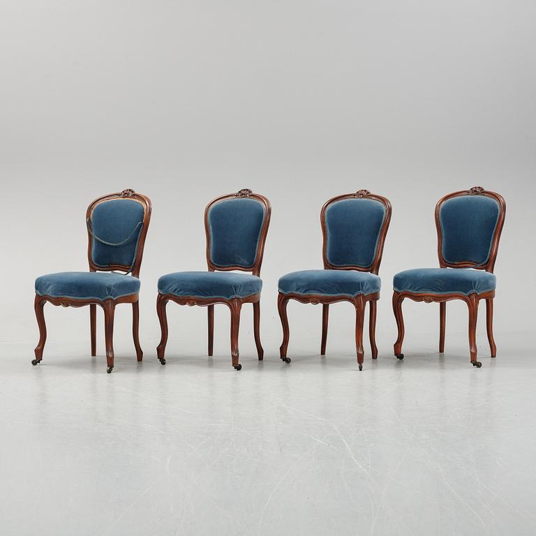 A sofa and a set of four chairs, Rococo revival, late 19th century.
