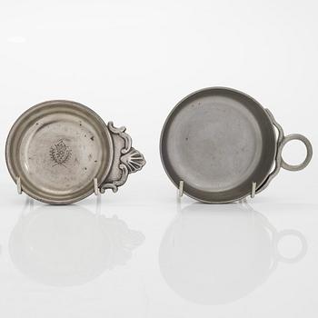 A set of fourteen tastevin cups, pewter and glass, 20th century.