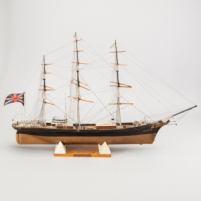 A model ship dated 1957 "Cutty Sark".