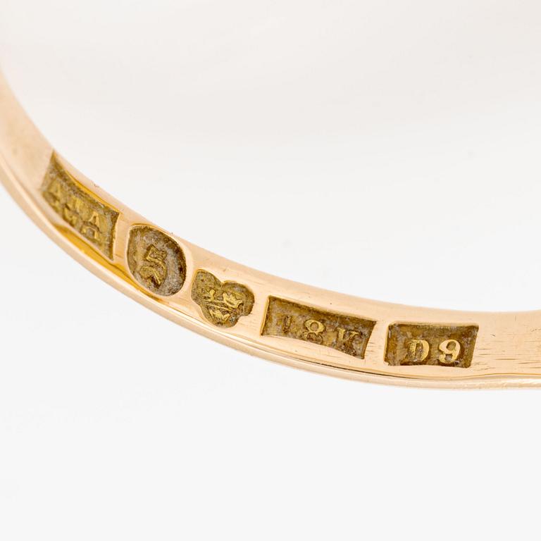 Ring 18K guld med snäckskalscamé.