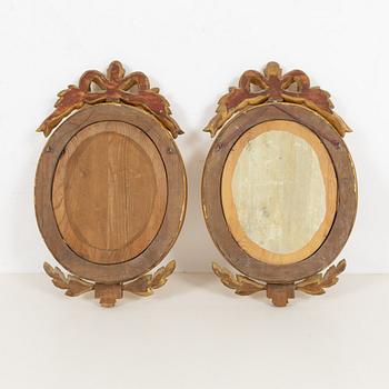 A pair of Gustavian style mirrors, 20th Century.