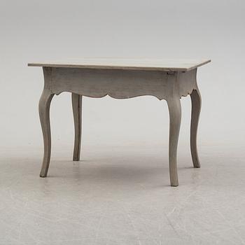 An 18th century rococo table.