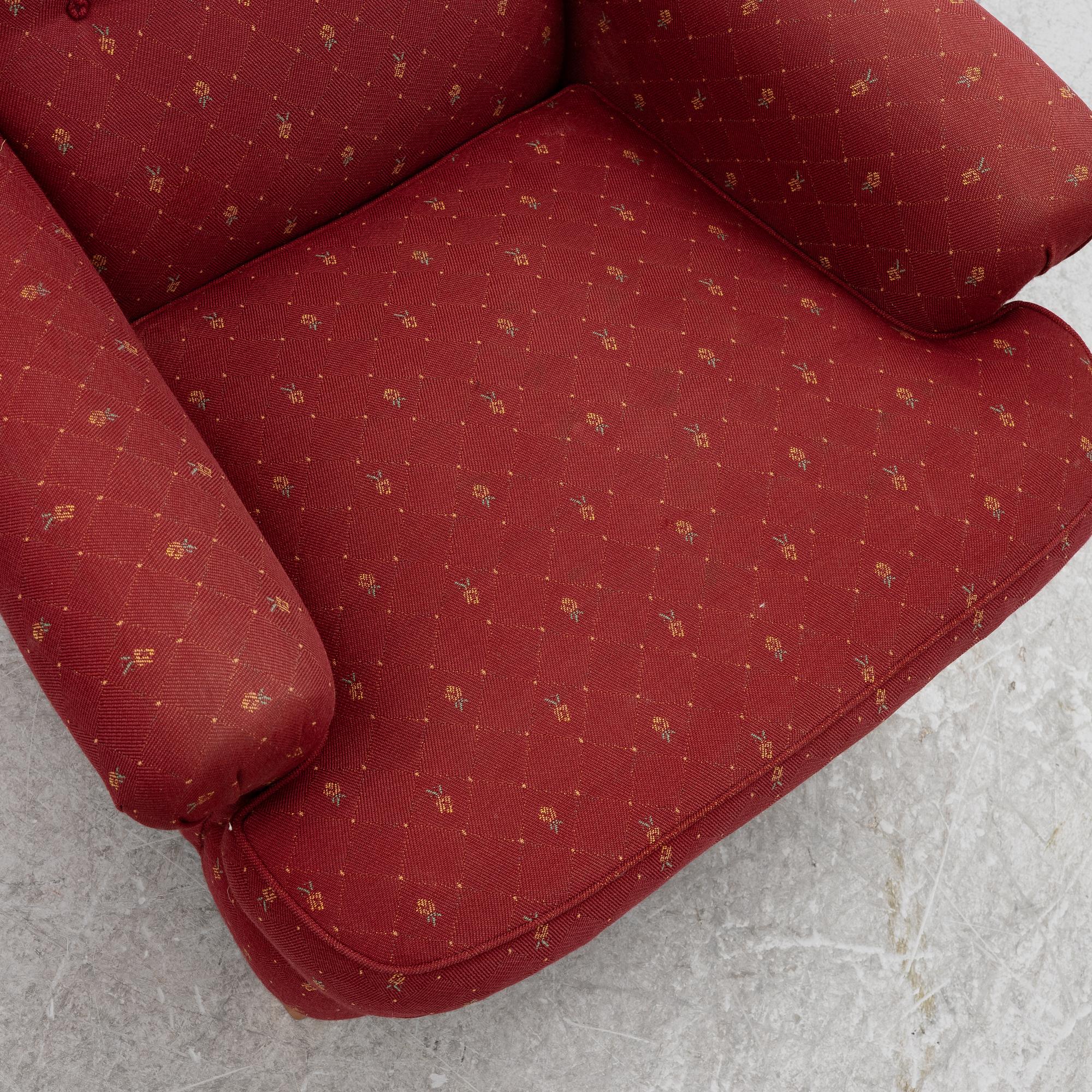 Carl Malmsten, a 'Häggbom' armchair with a 'Jättepaddan' ottoman, AB OH Sjögren, Tranås.