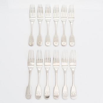 A 24-piece set of silver cutlery, Saint Petersburg 1870. Maker's mark A.K.