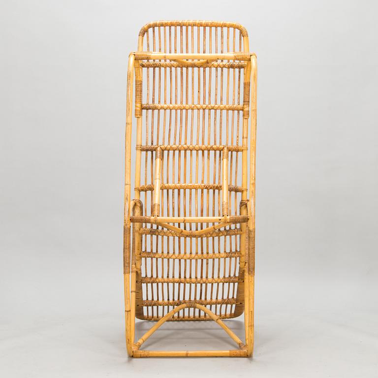 A rattan lounger, mid-20th century.