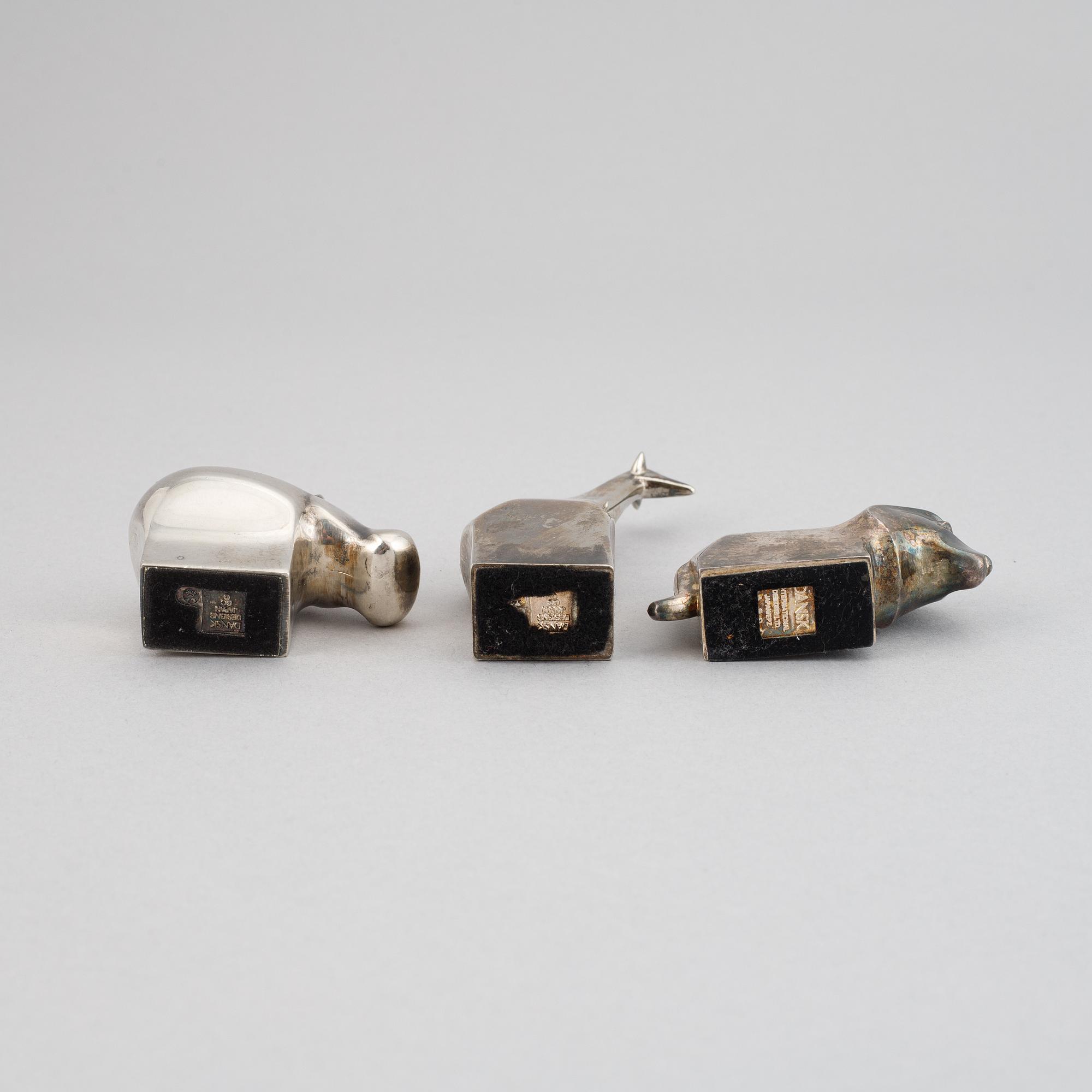 Three silver plated zinc figurines, Dansk Designs, Japan, including Gunnar Cyrén.