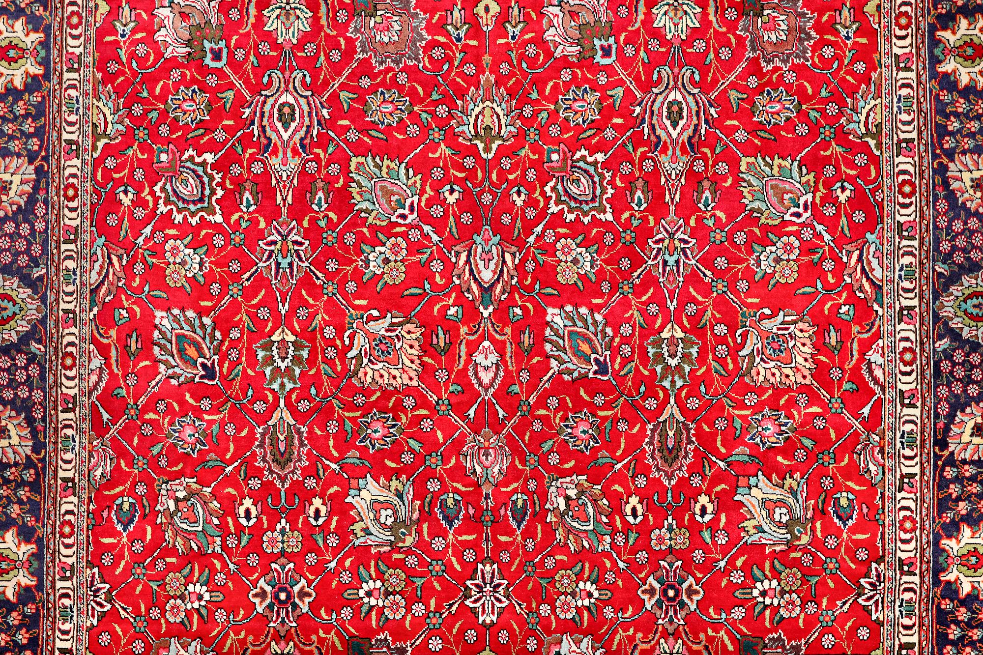 A Tabriz carpet, c. 302 x 294 cm.