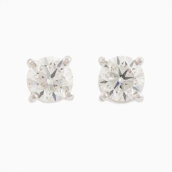 Brilliant cut diamond stud earrings, with IGI report.