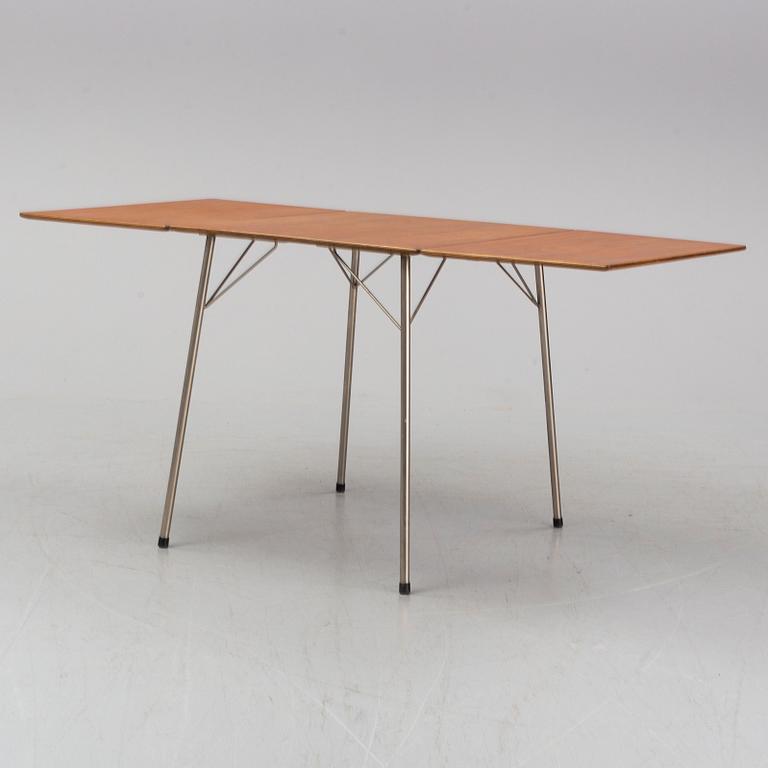 A table by Arne Jacobse, Fritz Hansen, Denmark. Designed 1952-1953.