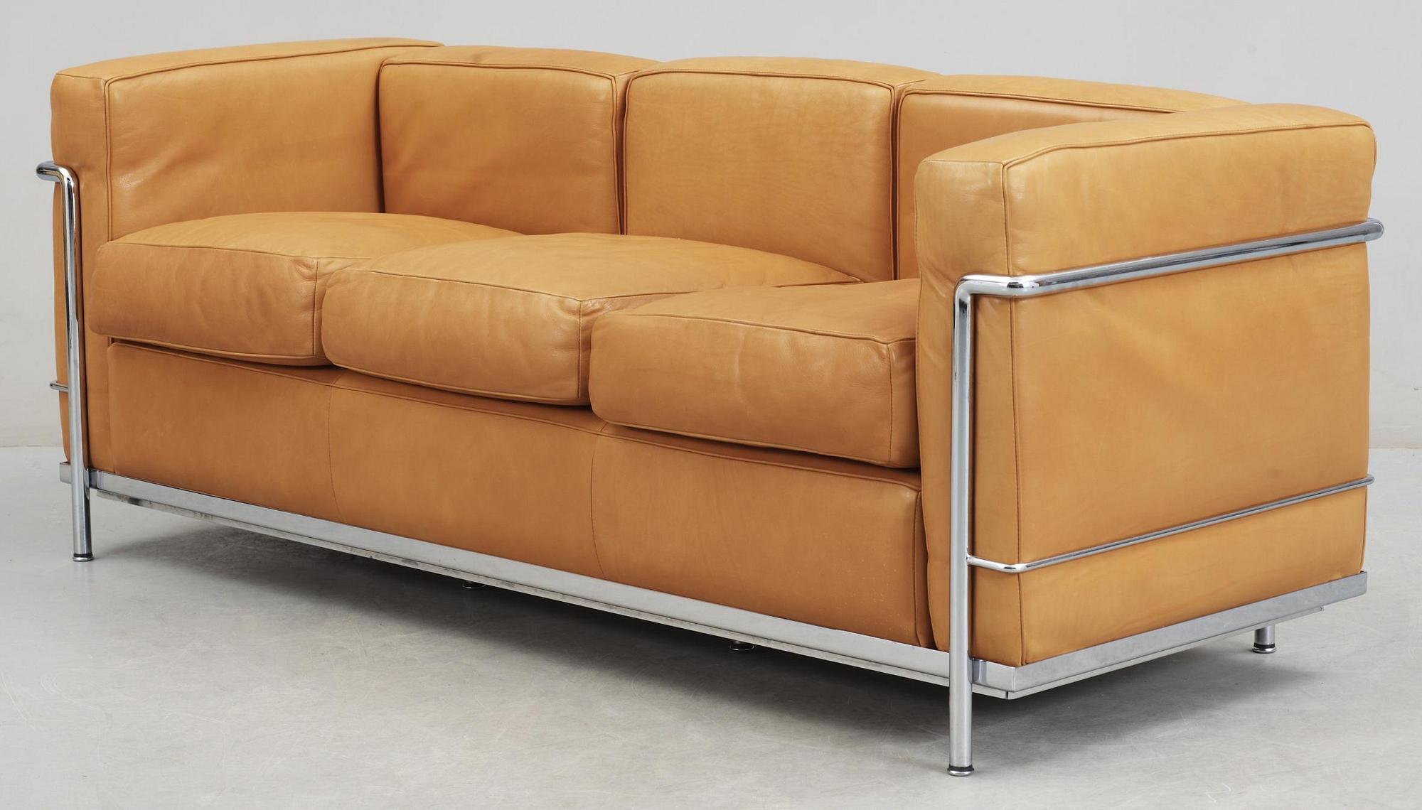 A Le Corbusier, Pierre Jeanneret & Charlotte Perriand 'LC 2' light brown leather three seated sofa, Cassina, Italy.