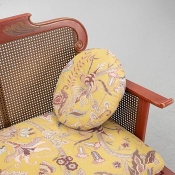A Swedish Grace sofa, armchair and coffee table, Herbert Anderssons Möbelverkstäder, 1920's.