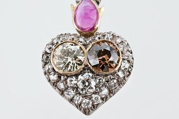 A DIAMOND AND RUBY BROOCH.