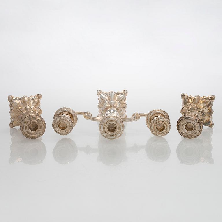 A silver candelabra and a pair of silver candlestick, Kultakeskus Hämeenlinna 1962 and 1985.