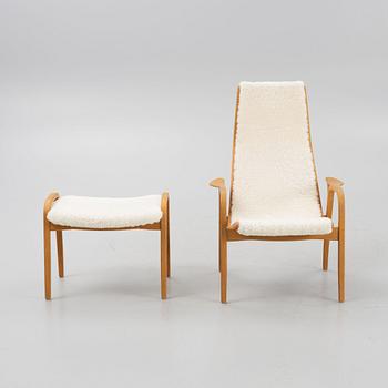 Yngve Ekström, a 'Lamino' armchair and a foot stool, Swedese.