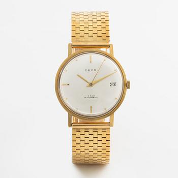 Deco, 18k wristwatch with bracelet in 18K gold, 34 mm.