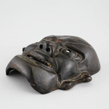 A bronze mask from Japan, Meiji (1868- 1912).