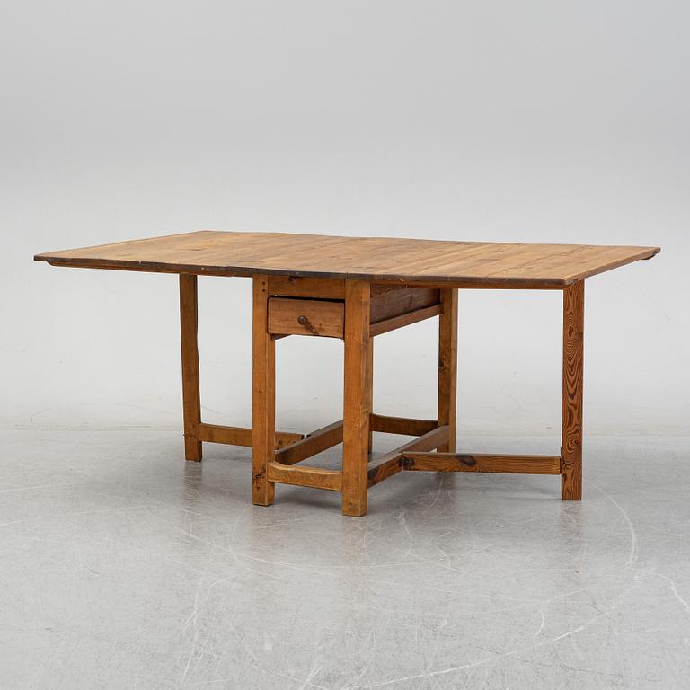 A 19th century gate-leg table.
