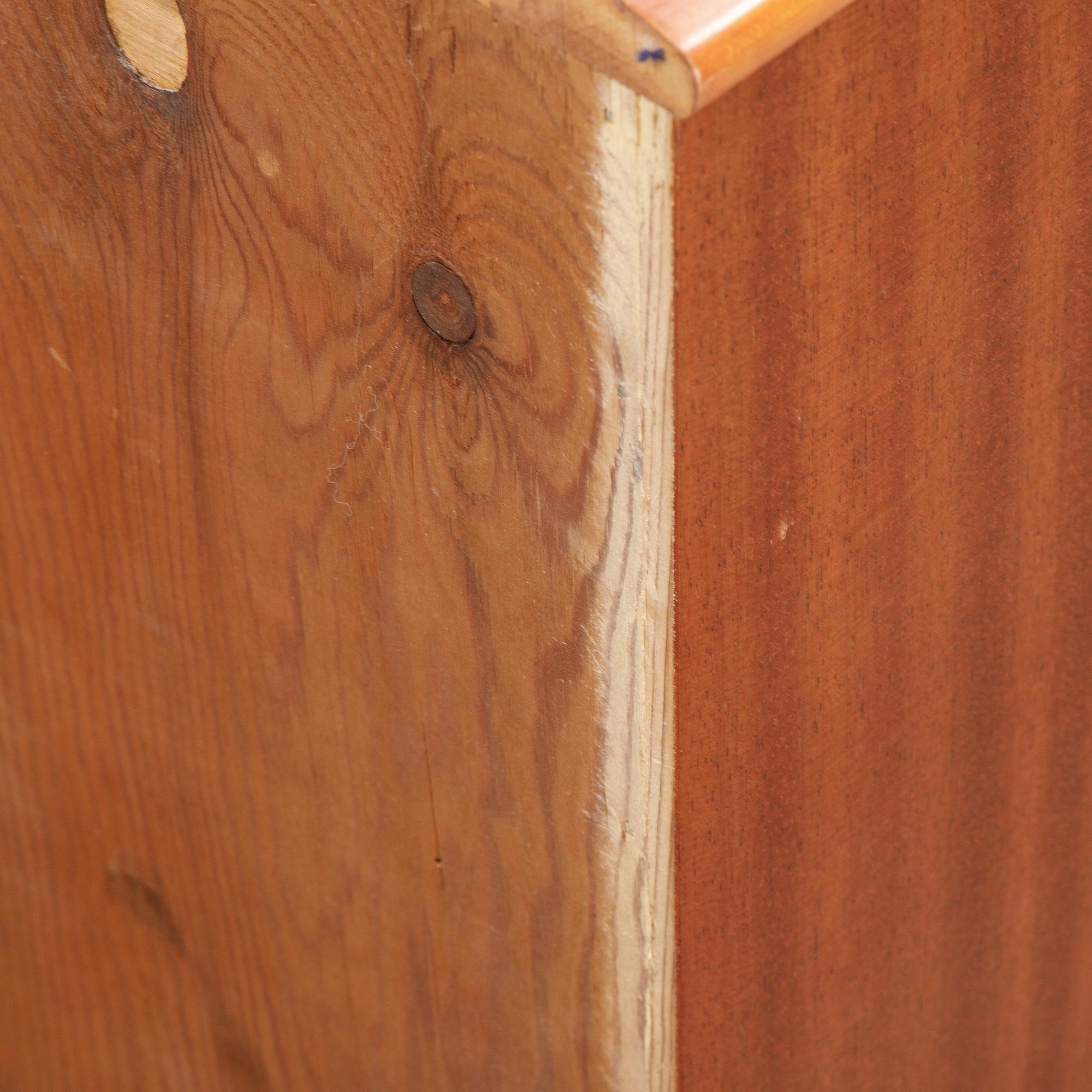 A mahogany veneered cabinet, mid 20th Century.