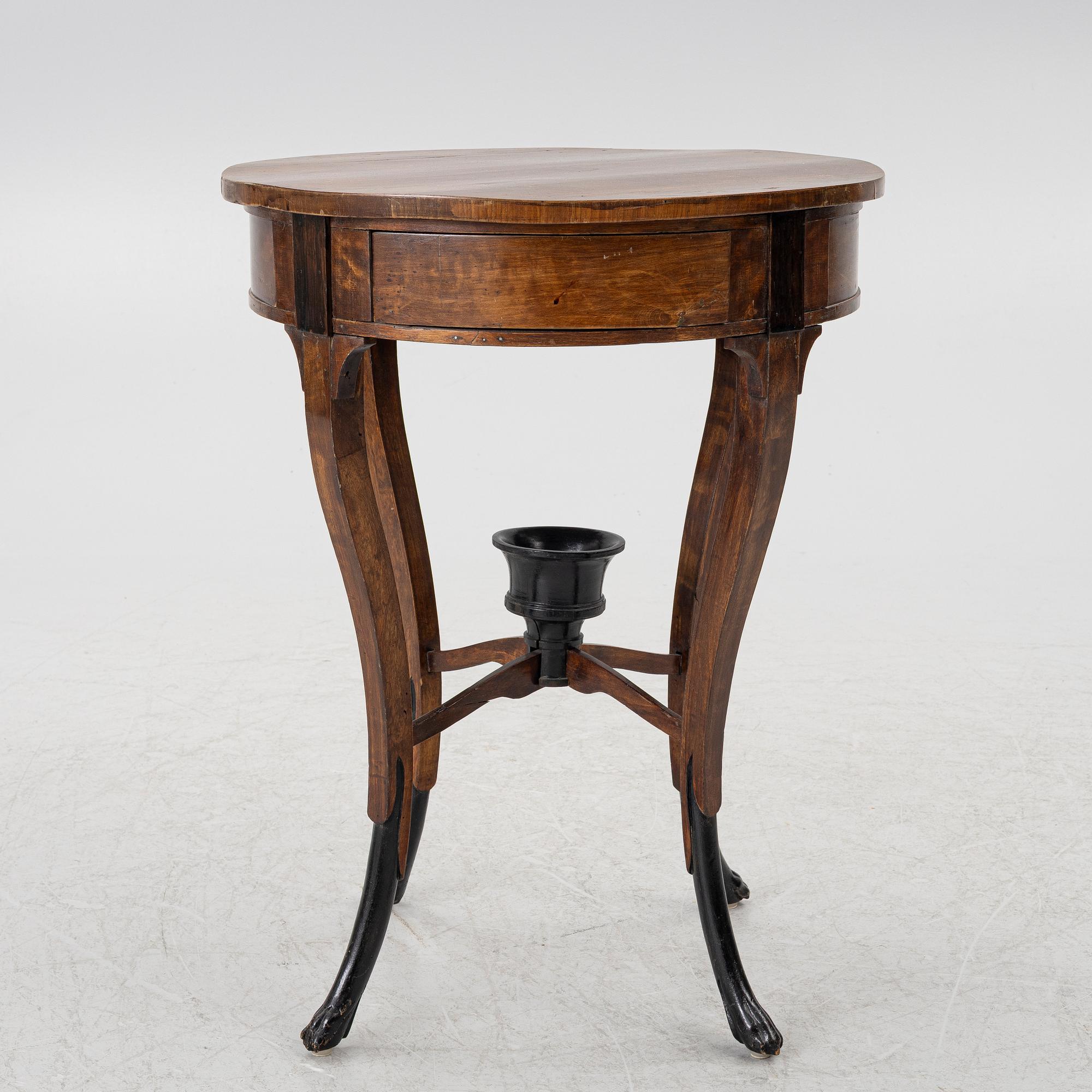 An Empire table, northern Europe, early 19th century.