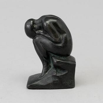 A small patinated metal skulpture "Sorrow", signed H. Frisendahl.