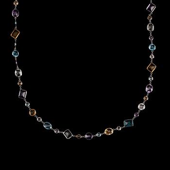 COLLIER, fasettslipade ametister, citriner, blå och vita topaser, tot. ca 102 ct.