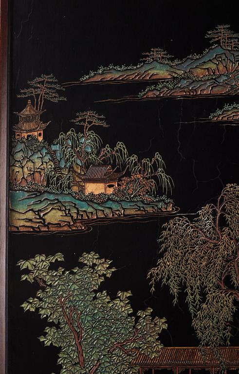 A set of four Chinese lacquer panels with wooden frames, early 20th century.