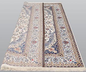 A carpet, Nain Part silk, 312 x 207 cm.