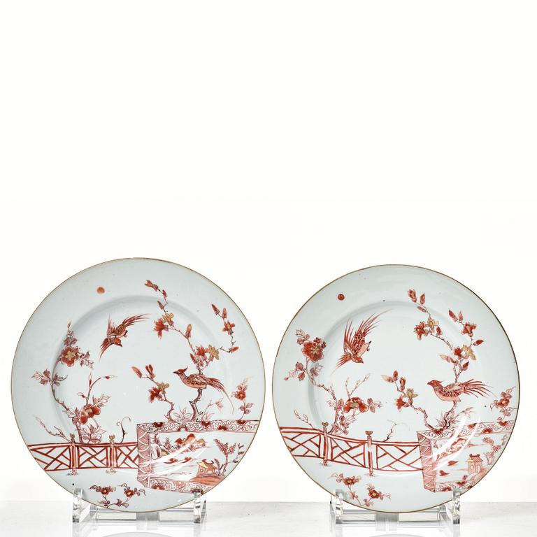 A set of nine rouge de fer decorated plates, Qing dynasty, early 18th Century.